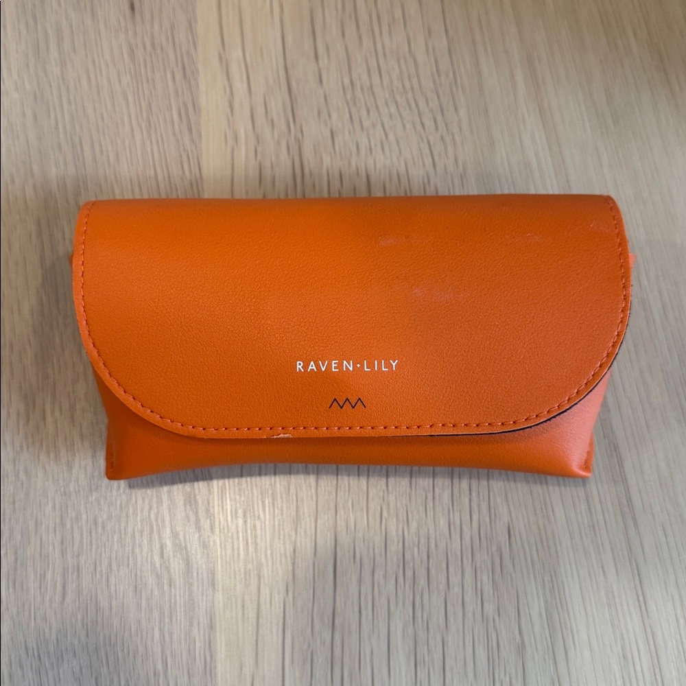 Raven + Lily Orange Amenity Bag